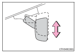 Ajustar a altura do espelho retrovisor (apenas espelho retrovisor interior antiencandeamento automático)