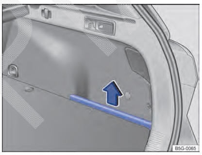 Fig. 168 No compartimento de bagagem: porta- -objetos lateral.