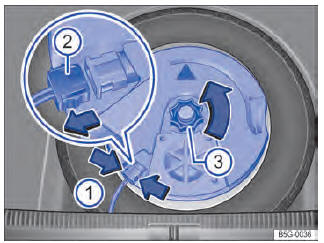 Fig. 249 No compartimento de bagagem: Remover o subwoofer (variante 1).